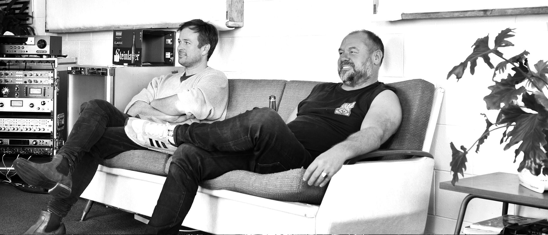 Two members of Con Carne in the studio