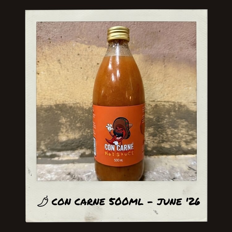 Polaroid of the Con Carne 500ml Hot Sauce bottle, captioned 'Con Carne 500ml, June 26'